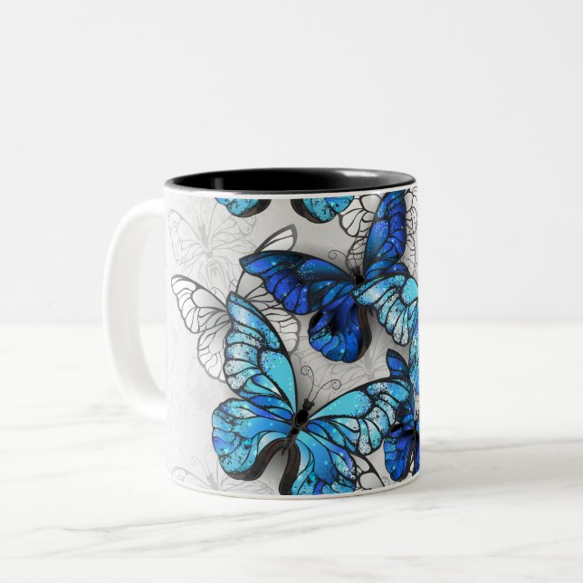 Composition of White and Blue Butterflies Two-Tone Coffee Mug (Front Left)