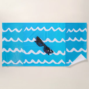 concept of beach vacation on beach towels