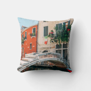 CONCRETE BRIDGE BESIDE WHITE BUILDING CUSHION