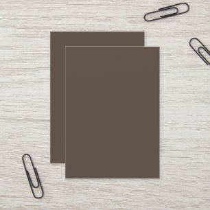 Confidently Against a Stylish Brown Wall Business Card