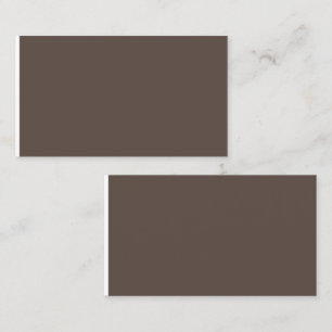 Confidently Against a Stylish Brown Wall Calling Card