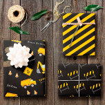 Construction Happy Birthday, Boy Name Age Pattern Wrapping Paper Sheet<br><div class="desc">Celebrate your little one's special day with this custom boy wrapping paper sheet set with an adorable construction theme. The gift wrap has a pattern of a dump truck and excavator working together at a road construction site. There are also orange traffic cones, dirt piles, and a safety divider with...</div>
