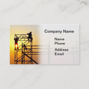 Construction Site with Workers at Sunset Business Card
