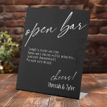 Contemporary Handwriting Funny Open Bar Black Pedestal Sign<br><div class="desc">This collection features an elegant, modern, handwritten font to create key words and phrases. In this piece, graphic typography overlays simply read "open bar" at the top and "cheers!" at the bottom. This option includes the popular message "Tonight's drinks are free. Tomorrow's stories will be priceless... (and well-documented.) Proceed accordingly."...</div>