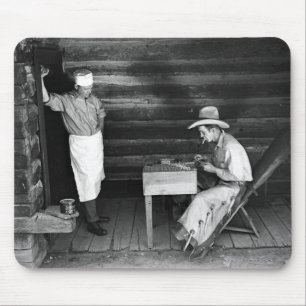 Cook watching a cowboy play cards mouse mat