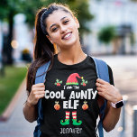 Cool aunty elf family matching christmas name T-Shirt<br><div class="desc">Get into the holiday spirit with this humourous Cool aunty elf t-shirt which is part of a matching family elf outfit collection containing gifts for any member of the family. Perfect for any Christmas family reunion, this t-shirt features a cute elf hat and fun legs, with the caption "I am...</div>