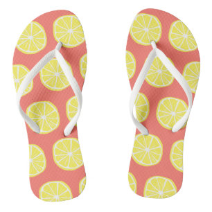 Cool Bright Yellow Lemon Slice Pattern on Coral Flip Flops