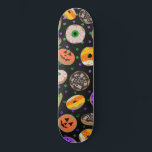 Cool Cute Glitter Confetti Donuts Halloween Skateboard<br><div class="desc">This cool and cute Halloween pattern is perfect for a fun and sweet vibe. It features jack o' lantern pumpkin, ghost, spider, candy corn, monster, and eyeball illustration donuts on top of faux printed sparkly glitter confetti with a simple black background. The color scheme includes green, purple, yellow, orange, brown,...</div>