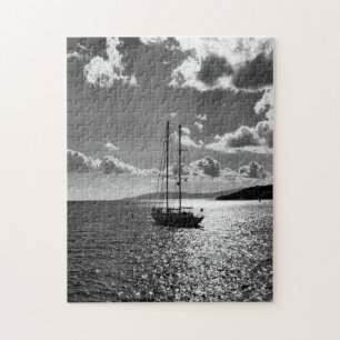 Cool dramatic sky over yacht on sea jigsaw puzzle