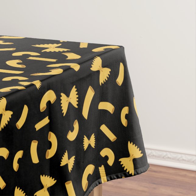 Cool fun pasta macaroni pattern on black tablecloth (In Situ)