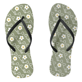 Cool hearts and white flowers on green background flip flops