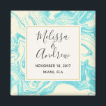 Cool Marble Design in Turquoise and Cream Wedding Magnet<br><div class="desc">A save the date reminder or a simple commemorative item. A stylish and sophisticated wedding magnet with an elegant faux marble pattern with swirling colours in turquoise blue and cream colours. Layered over top is a cream coloured frame with a gold border with your wedding details inside.</div>