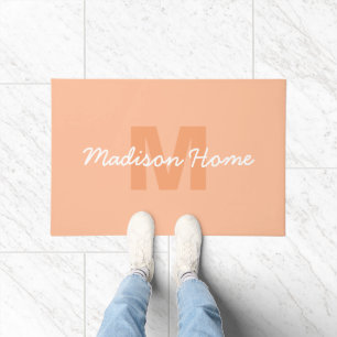 Cool pastel peach colour with Custom Monogram name Doormat