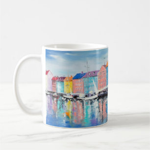 Copenhagen in a shining day, colourful buildings a coffee mug