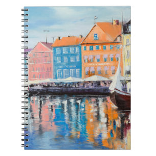 Copenhagen in a shining day, colourful buildings a notebook