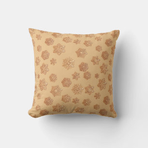 Copper 3-d snowflakes on a copper background cushion