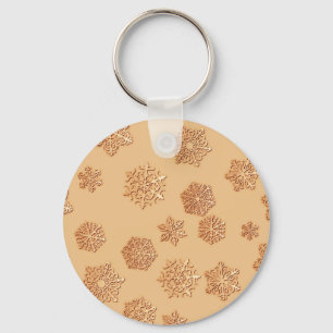 Copper 3-d snowflakes on a copper background key ring