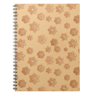Copper 3-d snowflakes on a copper background notebook