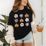 Coquette Halloween Pumpkins Flowers Skulls<br><div class="desc">Coquette Halloween Pumpkins Flowers Skulls Tri-Blend Shirt features the tflowers,  pumpkins and skulls in purple,  orange and white. Perfect for Halloween parties,  girls trip and celebrations. Created by Evco Studio www.zazzle.com/store/evcostudio</div>