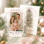 Coquette Pink Bow Photo Christmas Holiday Card<br><div class="desc">Share holiday joy with this elegant Merry Christmas photo card. Featuring your family photo framed by watercolor evergreens, ornaments, and a festive coquette pink bow, this design beautifully blends seasonal charm with a modern touch. The front showcases your holiday greeting and family name, while the back includes space for a...</div>