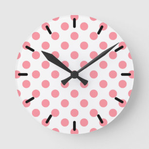 Coral and white polka dots round clock