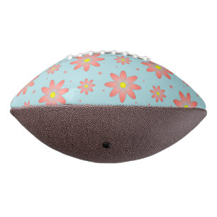 Coral pink and powder blue delicate daisy flowers  american football