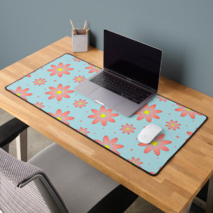 Coral pink and powder blue delicate daisy flowers desk mat