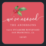 Coral Red Holly We’ve Moved Address Square Sticker<br><div class="desc">The Coral Red Holly We’ve Moved Address Labels feature elegant white lettering with a watercolor holly accent on a cheerful coral red background. Perfect for announcing your new address during the holidays,  these personalized labels add a bright and festive touch to family mailings,  Christmas cards,  and winter correspondence.</div>