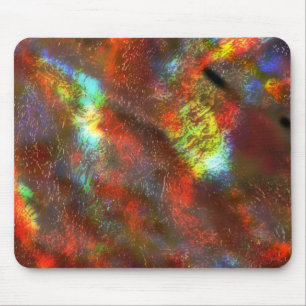 Coral to coloured stained texture under raw glass mouse mat