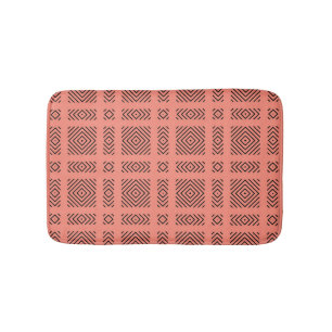 Coral with black geometric pattern bath mat