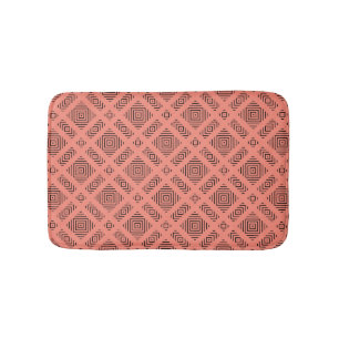 Coral with black geometric pattern bath mat