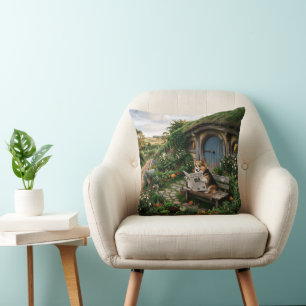 Corgi reading local newspaper in garden cushion