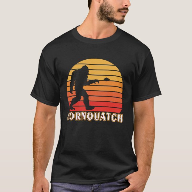 CornQuatch Cornhole Sasquatch Hitting Holes with B T-Shirt (Front)