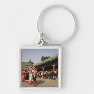 Costumed amateur folk dancers entertain key ring
