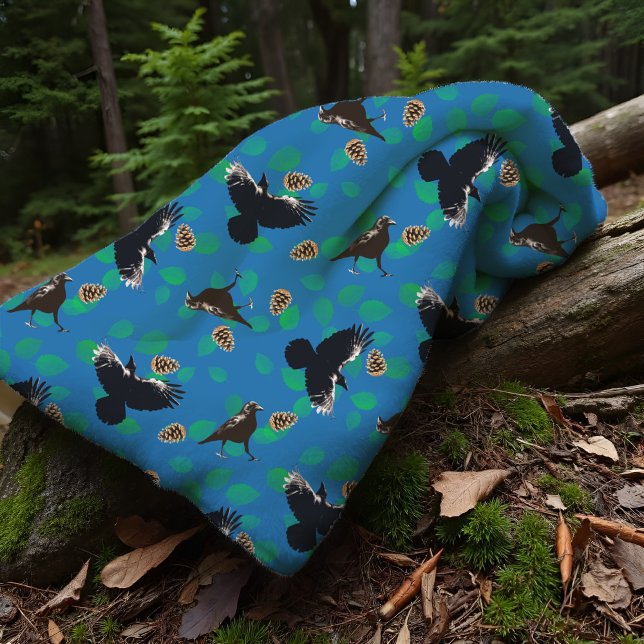 Cosy Crows In Flight Woodland Forest Blue Pinecone Fleece Blanket (Cozy raven fleece blanket: vibrant blue woodland throw with pinecones, leaves, and birds in flight.)