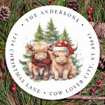 Cosy Highland Cow Farm Christmas Return Address Classic Round Sticker<br><div class="desc">Looking for the cutest Christmas cards of the season! Our Highland Cow duo featuring two holiday calves are sure to bring a smile to your loved ones' faces. The design is adorable with the calves wearing a Santa hat and a plaid winter scarf, surrounded by trees and a cosy winter...</div>
