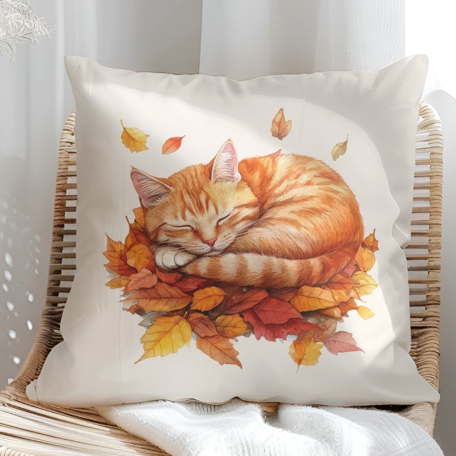 Cosy Sleeping Ginger Cat Pillow – Cream Edition (Cozy Sleeping Ginger Cat Terracotta Pillow in a sunny boho rattan chair.)