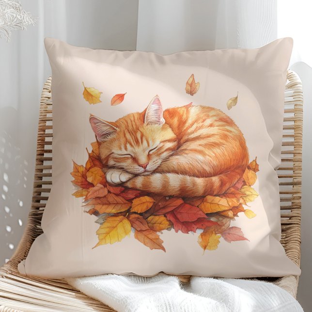 Cosy Sleeping Ginger Cat Soft Blush Pillow  (Cozy Sleeping Ginger Cat Terracotta Pillow on a sunny boho rattan chair.)