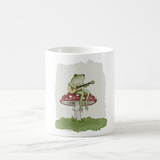 Cottagecore Frog Playing Guitar on Mushroom Art Coffee Mug