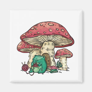 Cottagecore frog with mushroom house magnet