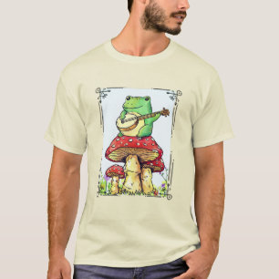 Cottagecore frog with mushroom house playing banjo T-Shirt