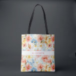 Cottagecore Watercolor Floral Name Gift Wildflower Tote Bag<br><div class="desc">Carry a touch of spring wherever you go with this personalized watercolor wildflower tote bag. Soft blooms in blush pink, dusty blue, peach, and golden yellow create a dreamy, painterly pattern that feels cheerful, feminine, and effortlessly chic. The customizable name adds a stylish personal touch, making this tote perfect for...</div>