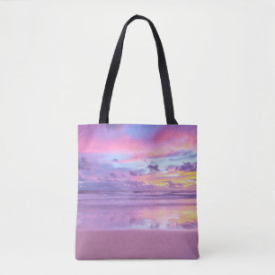 Cotton candy sunrise: beach view. tote bag