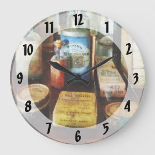 Cough Remedies and Tooth Powder Large Clock