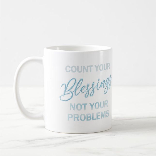 Count your blessings not your problems coffee mug (Left)