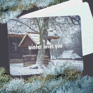 Country cottage in the snow holiday card