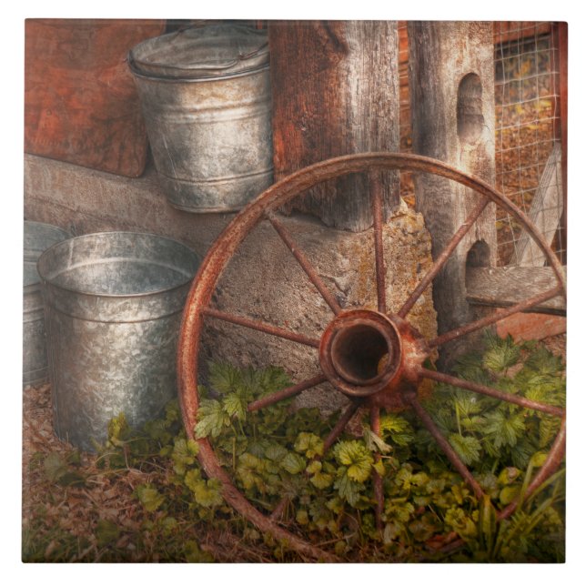 Country - Some dented pails and an old wheel Tile (Front)