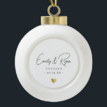 Couple Engagement Announcement Gold Heart Keepsake Ceramic Ball Christmas Ornament<br><div class="desc">Celebrate their love with a touch of elegance! This keepsake ornament features a custom gold heart—perfect for marking an engagement or wedding. A timeless way to remember their big day!</div>