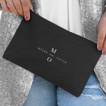 Couple Monogram Elegant Minimal Stylish Black Accessory Pouch<br><div class="desc">A minimalist monogram wedding design with elegant typography in white on a black background. The text can easily be personalised for your special day!</div>