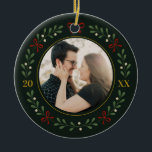 Couple Photo Wreath First Christmas Together Ceramic Tree Decoration<br><div class="desc">Celebrate your first holiday together with a classic wreath on forest green and a gold-lined photo window that flatters outdoor portraits. The clean layout keeps the focus on the two of you while the side digits mark the year.</div>